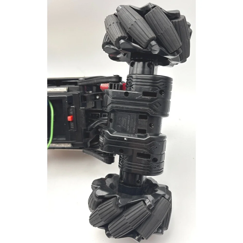 New Bright Slide Winder 4x4 RC Monster Truck Black Red Gold Roll Cage Toy